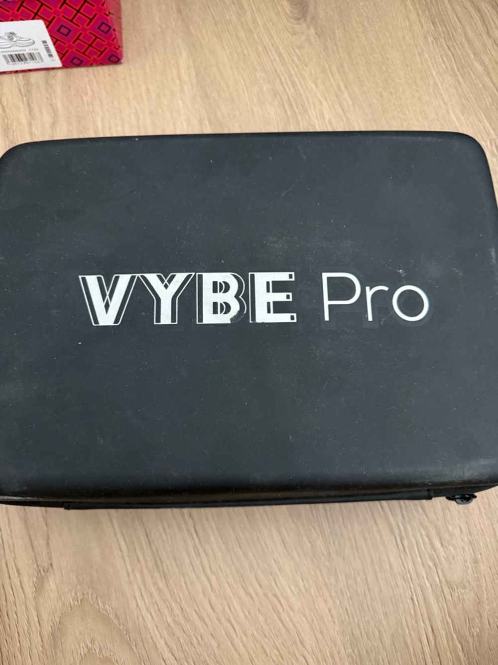 The VYBE Pro Percussion Massage Gun is a high-performance handheld device